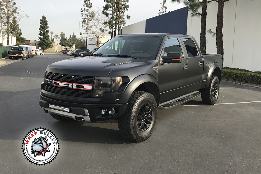 Dominant Stealth: Ford Raptor Unleashed with 3M Satin Black Truck Wrap