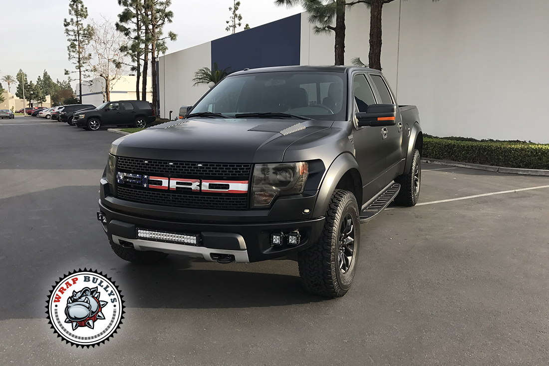 Dominant Stealth: Ford Raptor Unleashed with 3M Satin Black Truck Wrap
