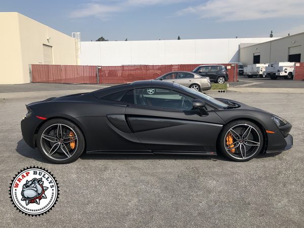 Unveil Stealth Elegance: McLaren Transformed with 3M Deep Matte Black Car Wrap