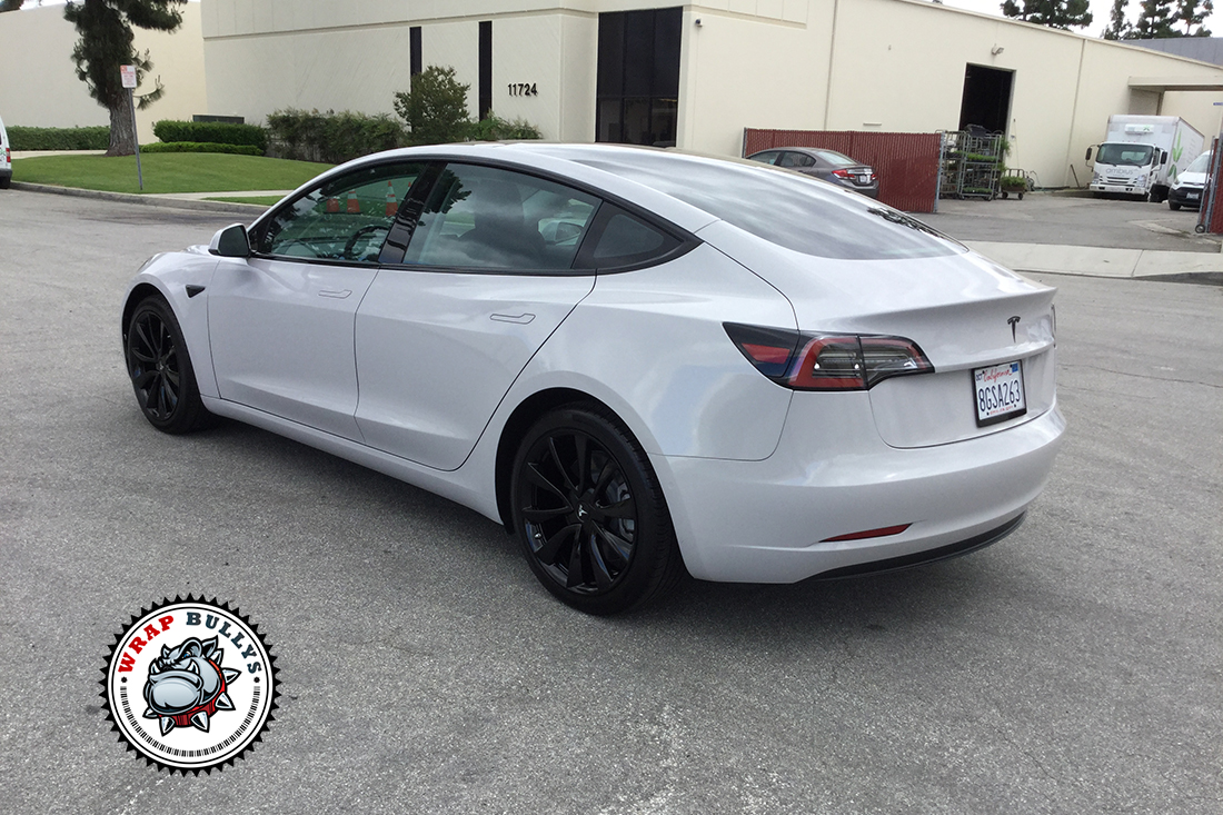 Stormy Elegance: Tesla Model 3 Transformed with 3M Gloss Storm Gray Wrap