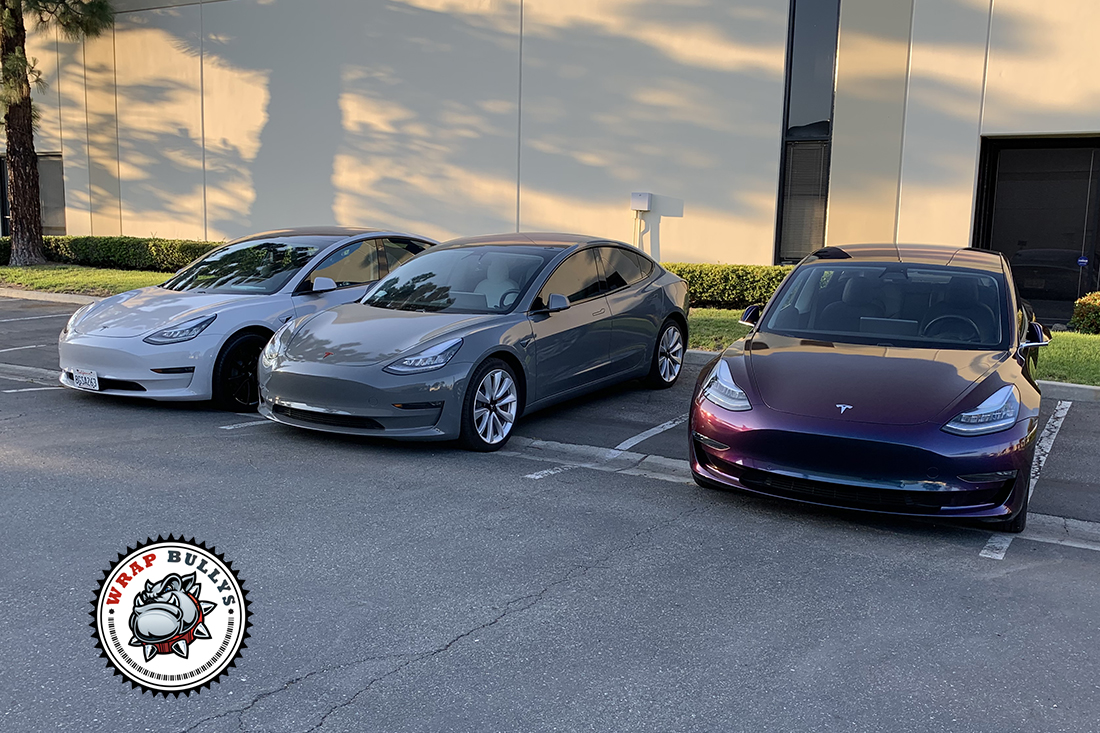Trifecta of Style: Tesla Model 3 Trio Wrapped in 3M Gloss Storm Gray, Avery Gloss Dark Gray, and 3M Gloss Rising Sun