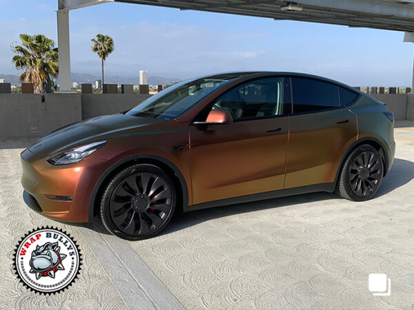 Radiant Revolution: Tesla Model Y Awakens with Avery Satin Rising Sun Red-Gold Vehicle Wrap