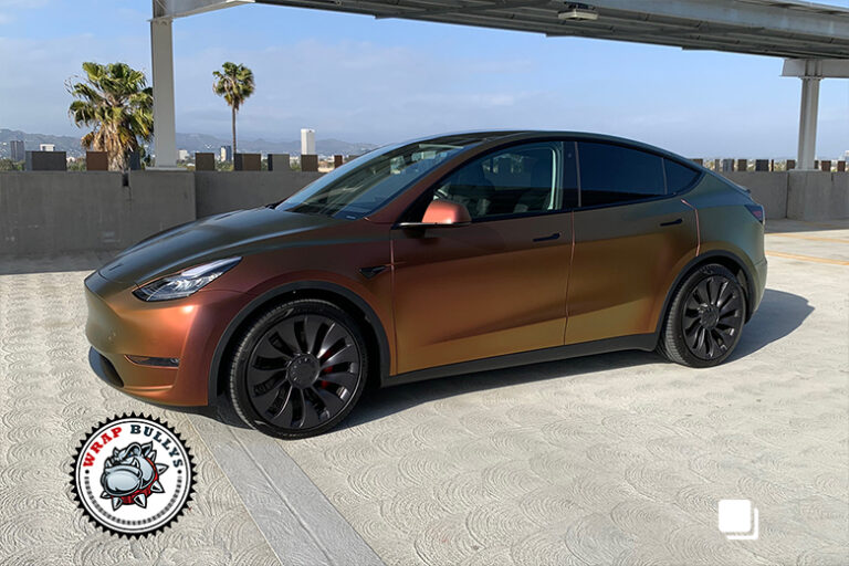 Side profile of Tesla Model Y in Rising Sun Red-Gold wrap – Gardena