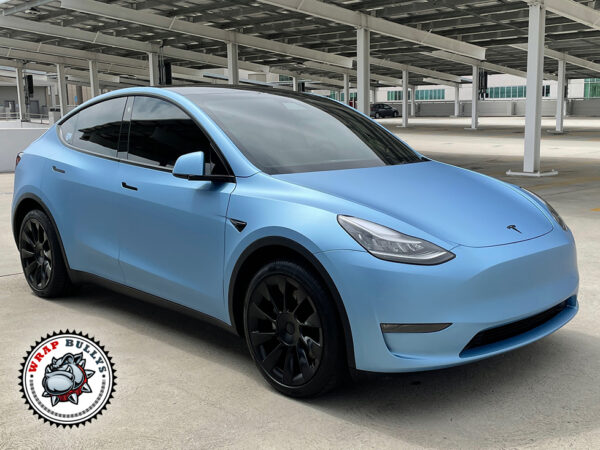 Arctic Elegance: Tesla Model Y Enhanced with Avery Matte Metallic Frosty Blue Vehicle Wrap