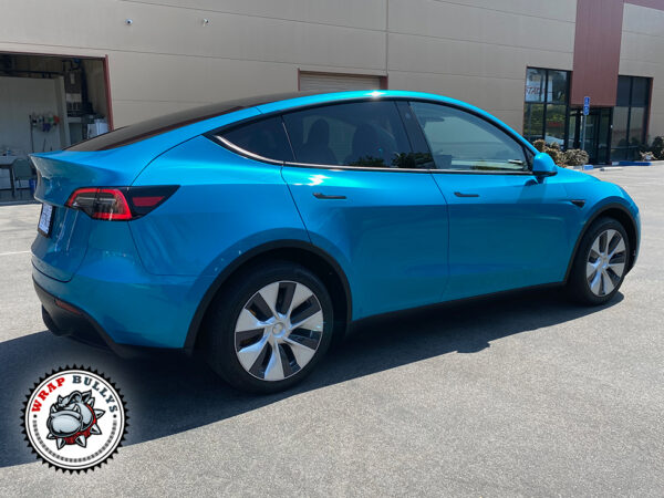 Electrifying Elegance: Tesla Model Y Transformed with 3M Gloss Atomic Teal Wrap