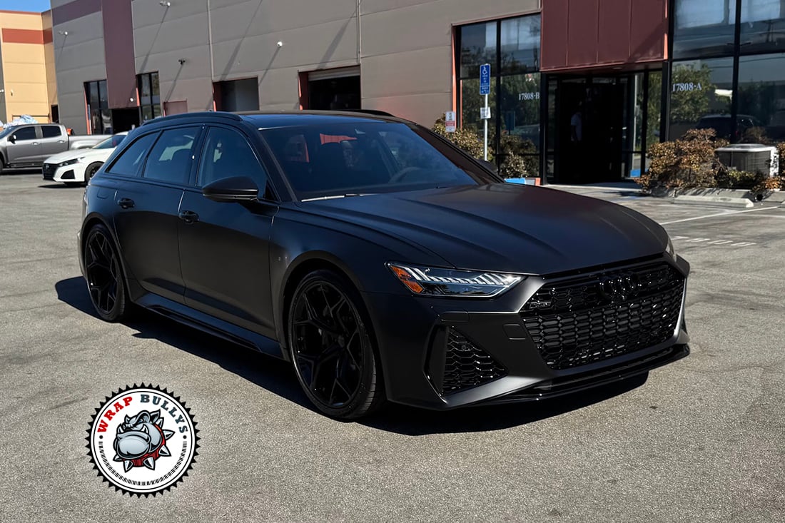 Audi RS 6 Avant rear angle satin black vinyl wrap