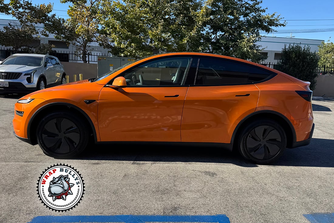 Close-up of 3M Gloss Liquid Copper on Tesla trim