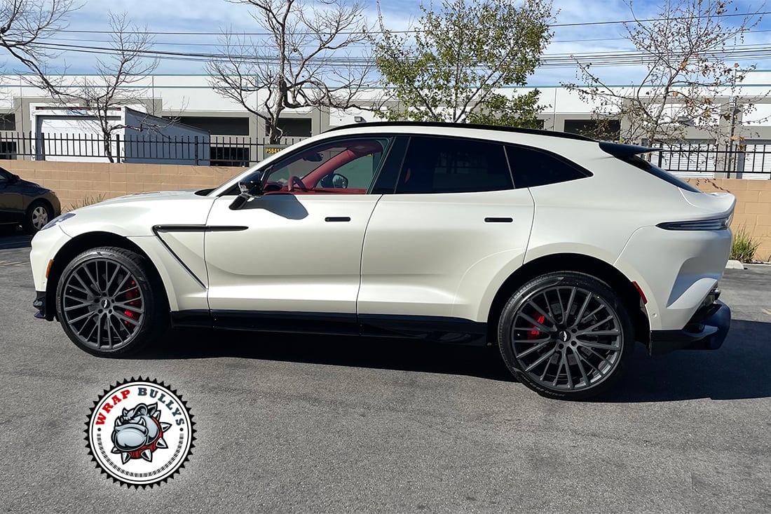 Side angle Aston Martin DBX 707 satin pearl white project South Bay