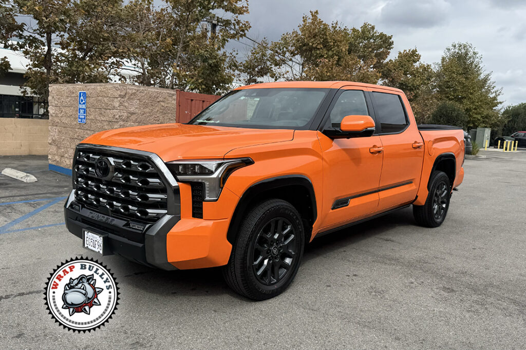 Toyota Tundra wrapped in 3M Burnt Orange, front passenger-side three-quarter view
